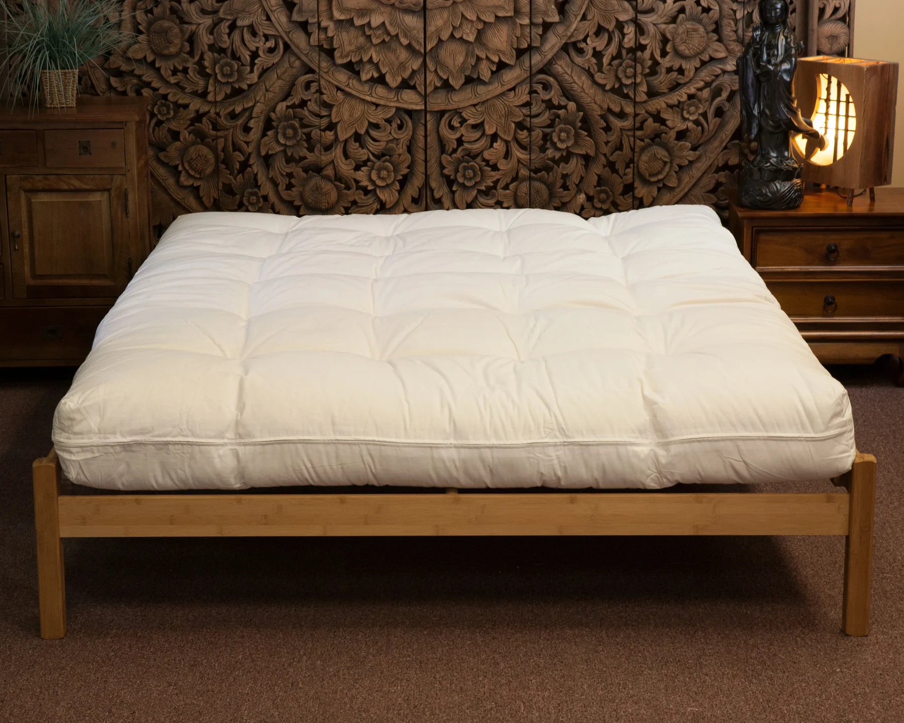 Organic Wellspring Supreme futon on bed